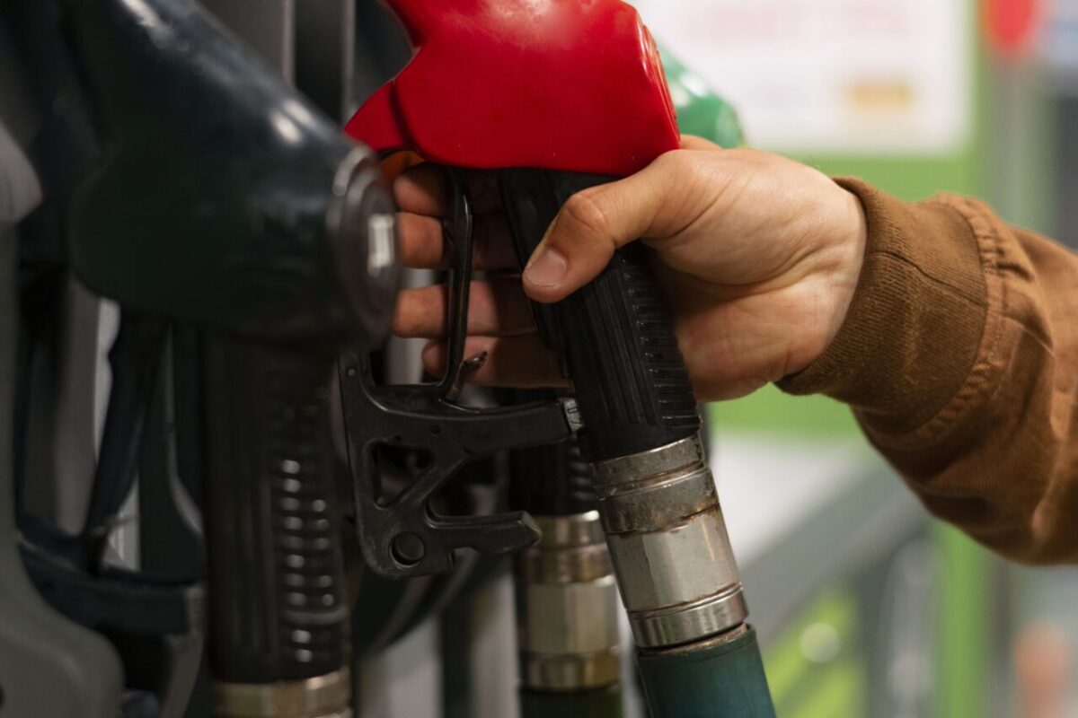 side-view-man-gas-station