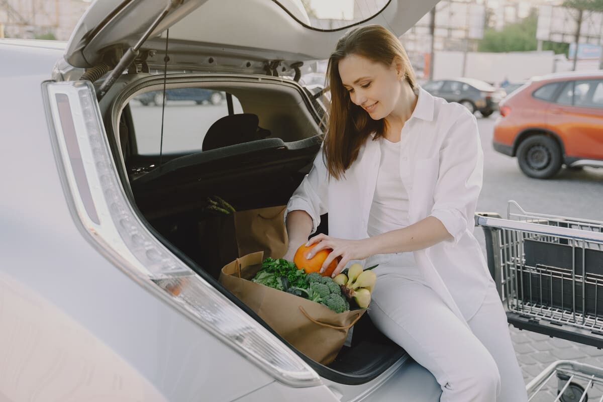 woman-charging-electro-car-electric-gas-station